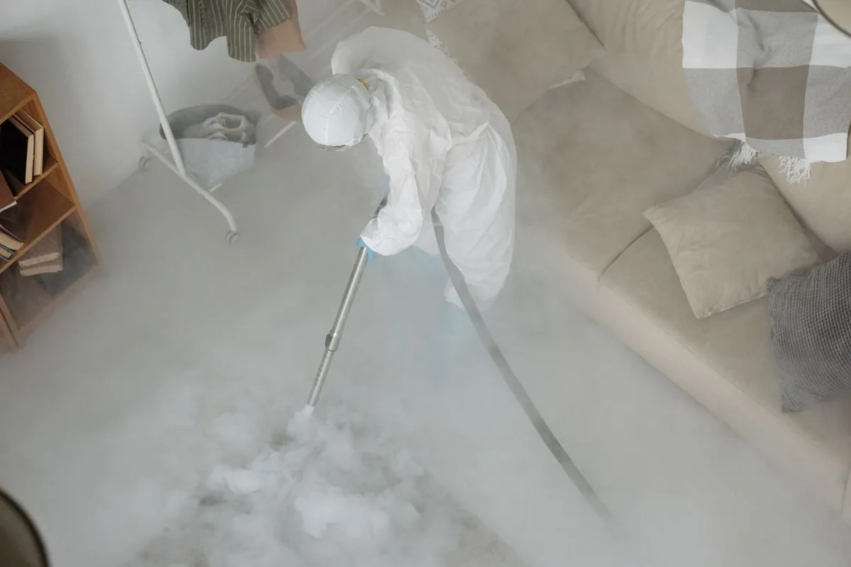 Biohazard cleanup technician in protective equipment, Shandon, CA